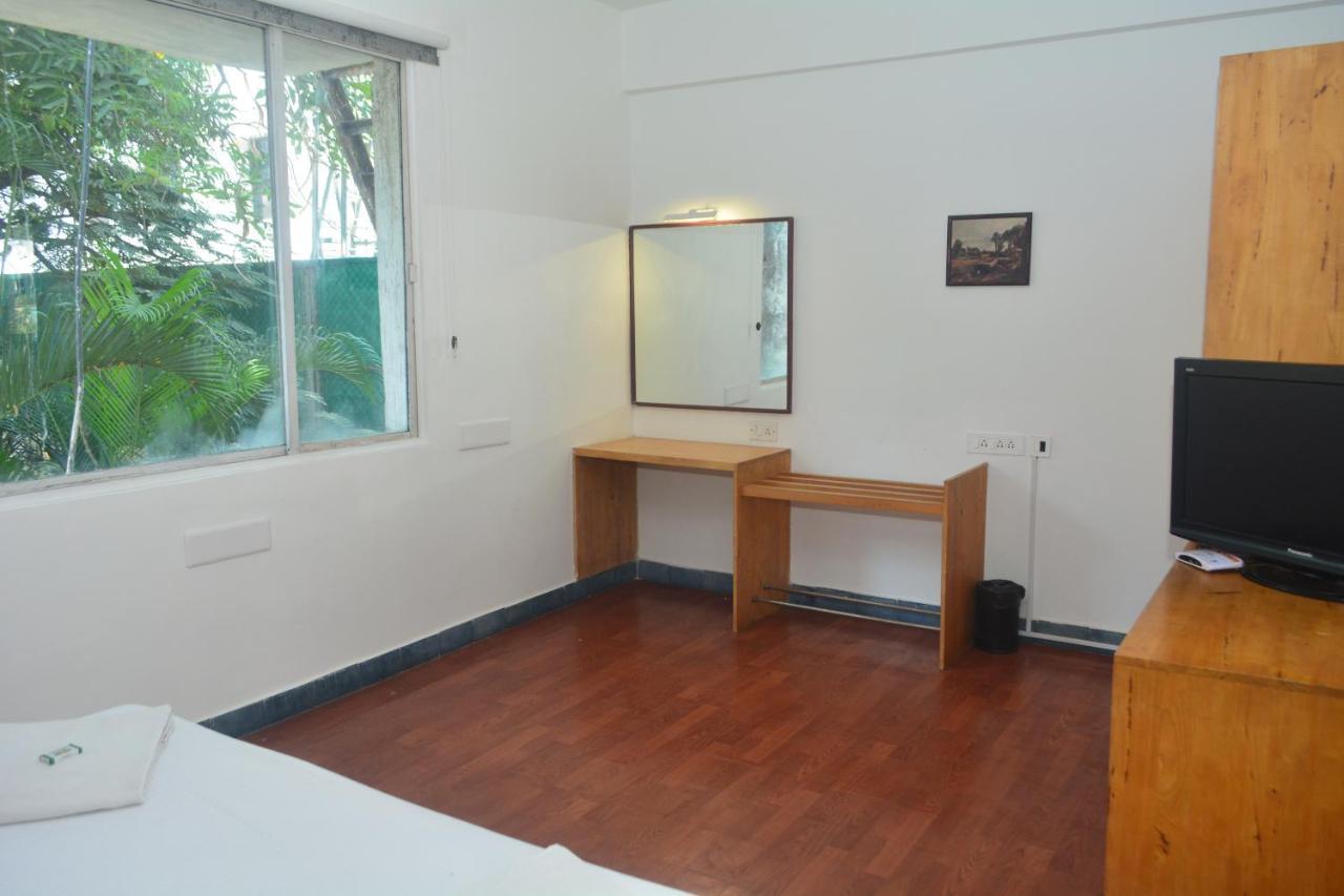 Dejavu Hotel Коимбаторе Екстериор снимка